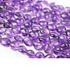 Natural African Amethyst Smooth Polished Tumble Beads Strand Length is 7 Inches & Size 12mm to 15mm Approx. Pronounced AM-eth-ist, this lovely stone comes in two color variations of Purple and Pink. This gemstones belongs to quartz family. All strands are best quality and hand picked. 